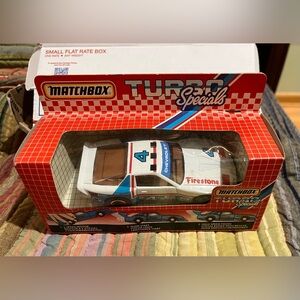 Firestone and Chevrole #4 Die cast Race car. 
Matchbox Turbo Special series